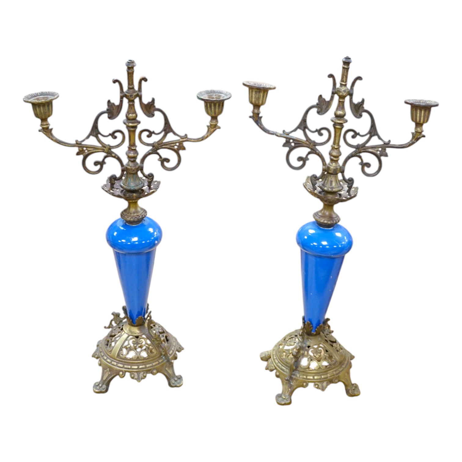 A pair of French blue enamelled ornate brass two branch candlesticks, 42cm high. Condition - one finial missing, scratches to enamel